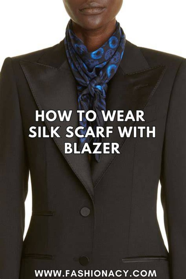 How do you wear a scarf with a women's suit jacket?