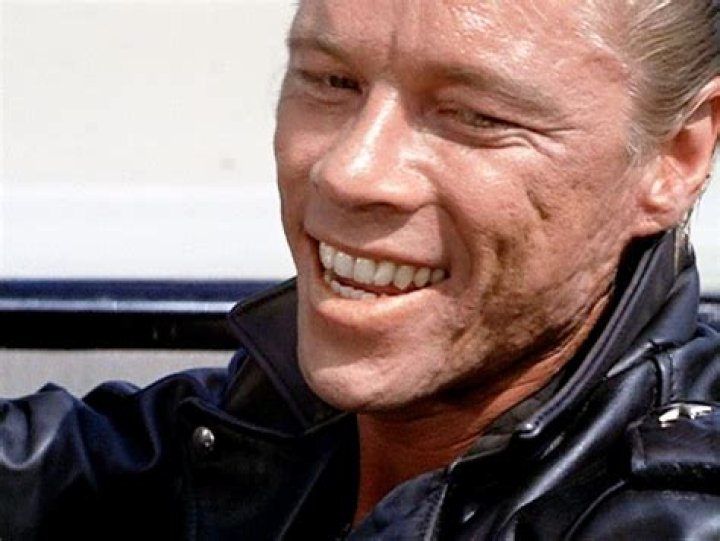 Who is the antagonist in Grease?